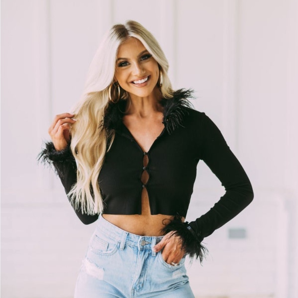 These three boutique feathered black sweater